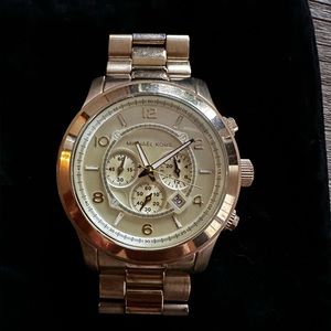 Oversized unisex gold tone Michael kors watch